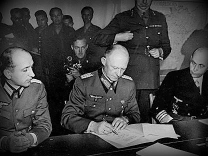 German Marshal Alfred Jodl signing the surrender of German armies in ...