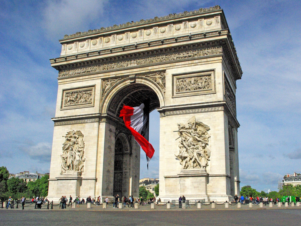 Arc de Triomphe and giant French flag © French Moments