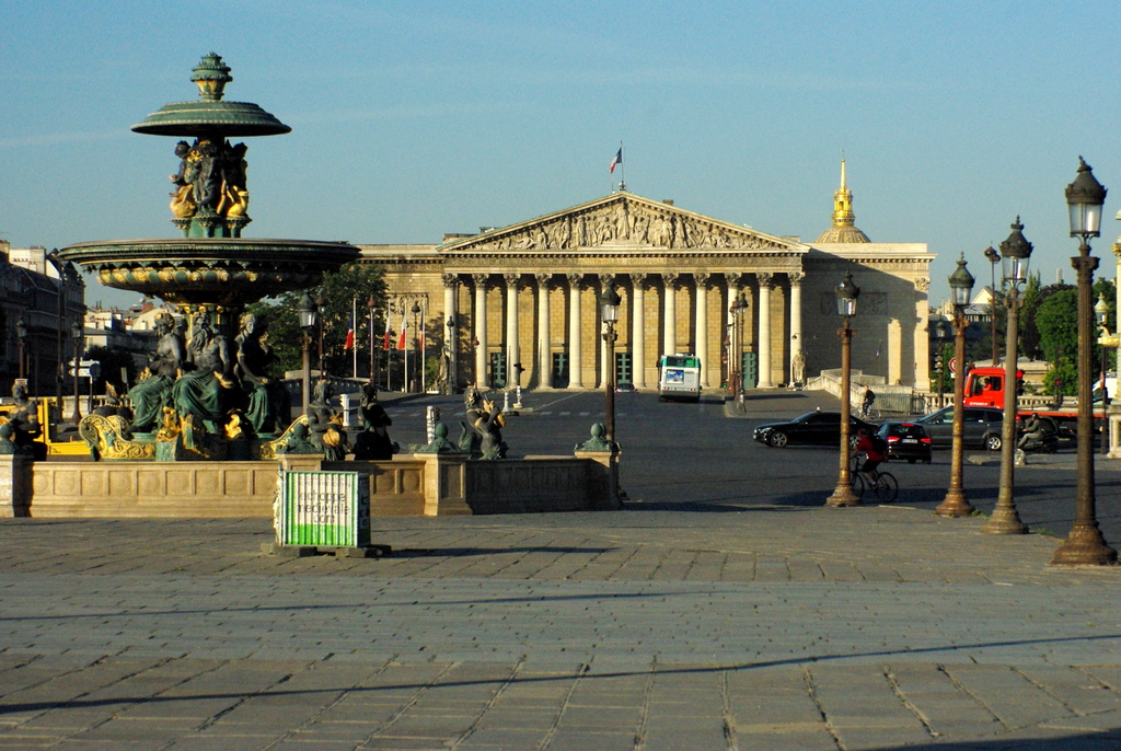 A red bouncy castle in the middle of a beautiful square in Paris