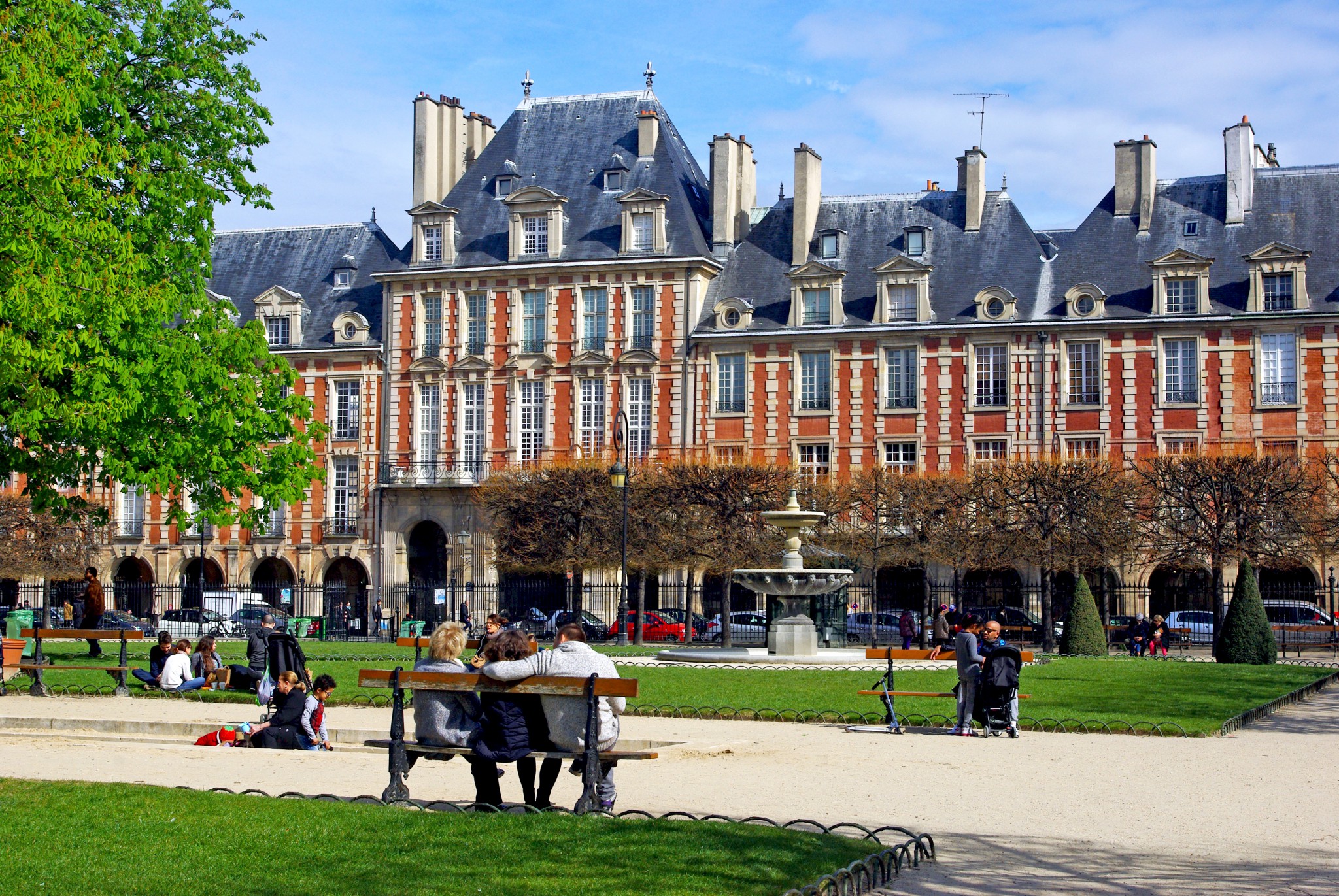 A red bouncy castle in the middle of a beautiful square in Paris