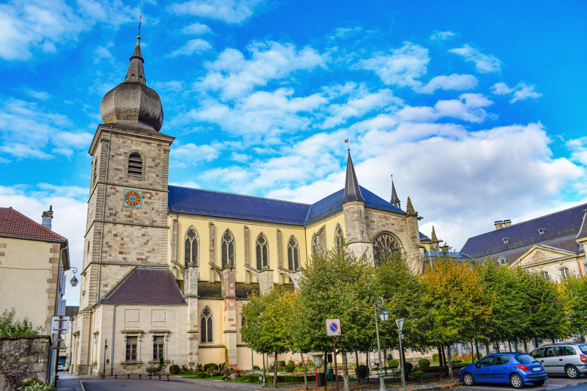 The abbey church of Remiremont and its bulbous bell tower © French Moments