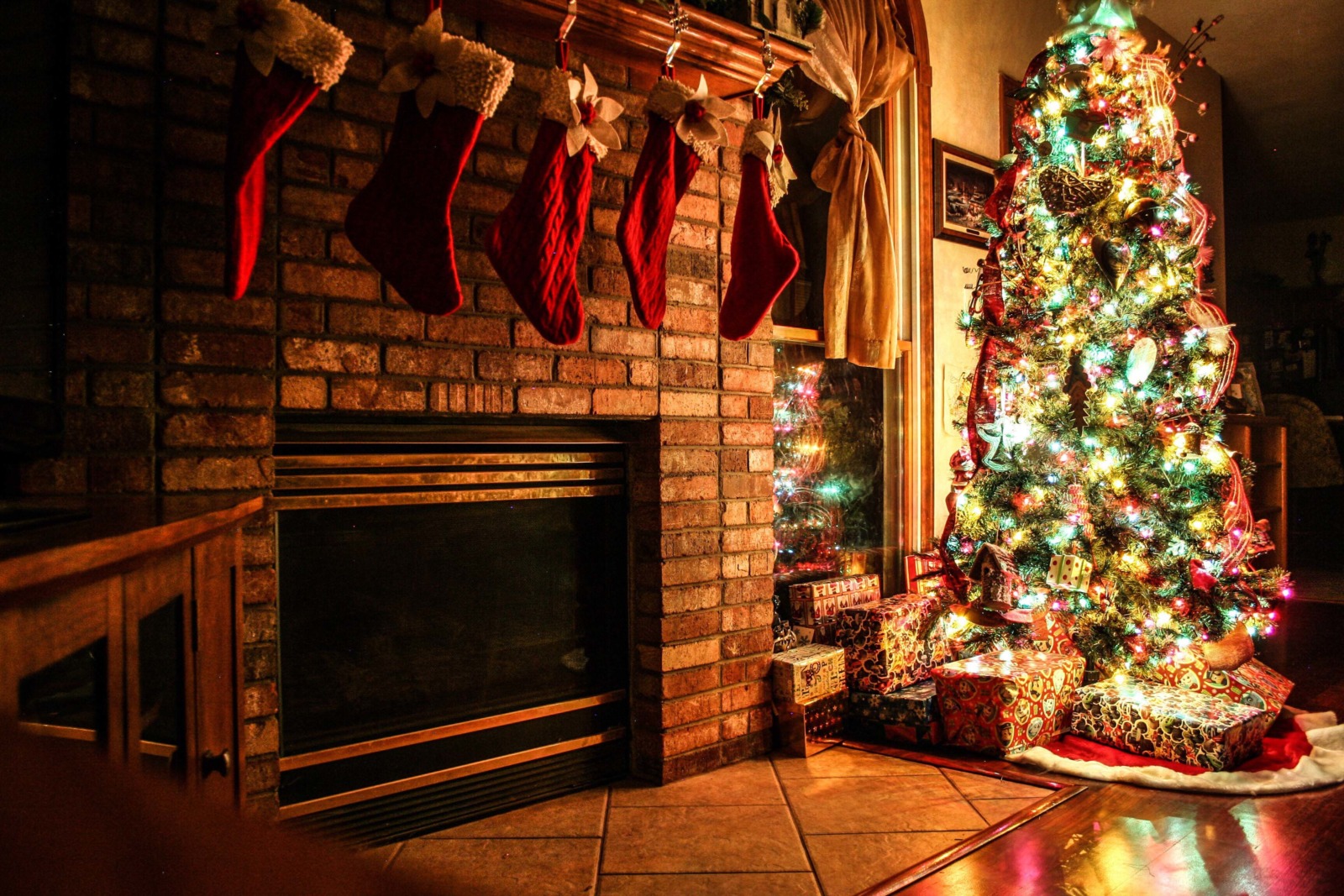 Christmas tree and fireplace. Photo by onematchoneexplosion via Twenty20
