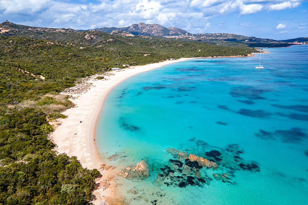 Mediterranean Cruise Experience. Sardinia Liscia Ruja Beach. Photo by estivillml via Envato Elements