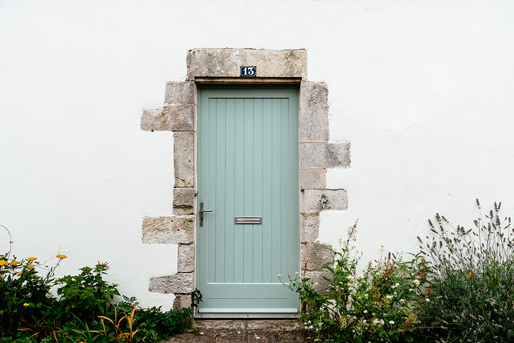 Old Wooden Door Ile de Ré. Photo by JJFarquitectos via Envato Elements