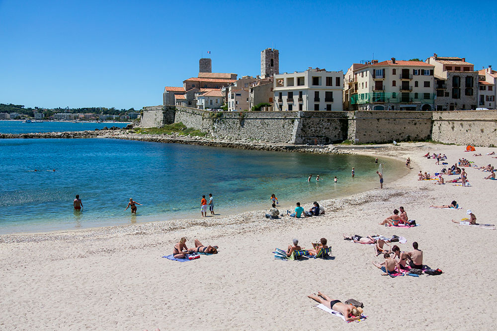 The beach of Antibes. Photo by SteveAllenPhoto999 via Envato Elements