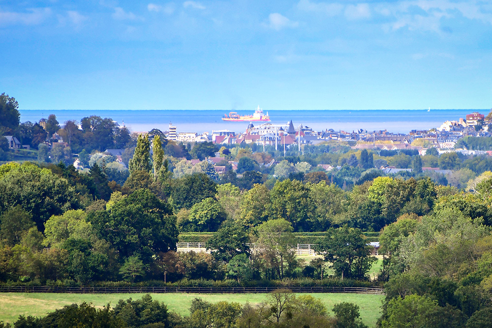 The viewpoint of Beaumont-en-Auge overlooking the Touques Valley, Deauville, Trouville and the English Channel