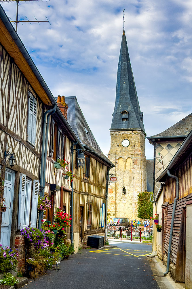 The surprising twisted spire of Moyaux Church